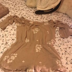 Tan Romper with white flowers
